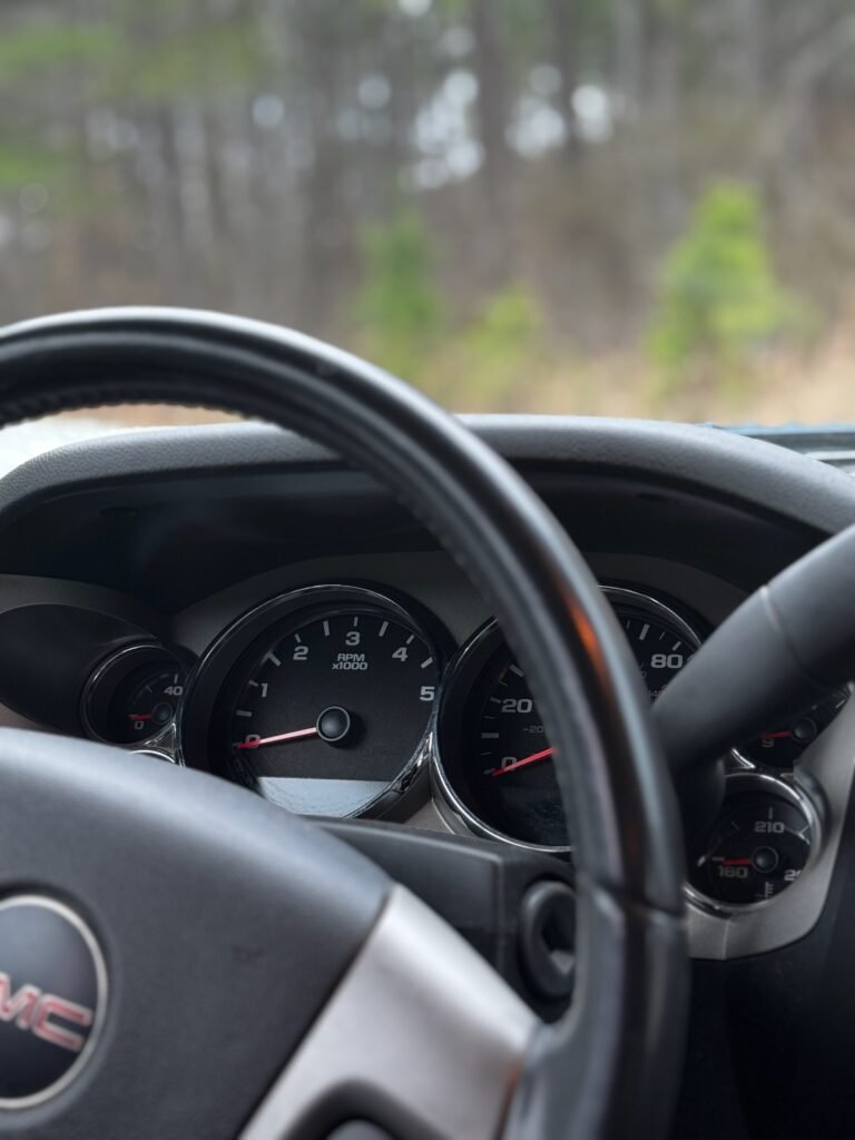 Close-up of a steering wheel and dashboard, symbolizing the journey of stepping into a new leadership role